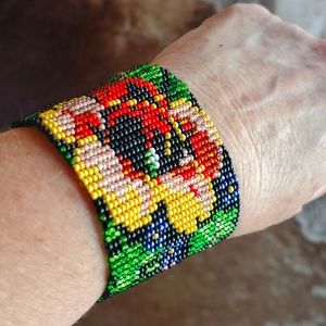 Wide Beaded floral design magnetic bracelet.